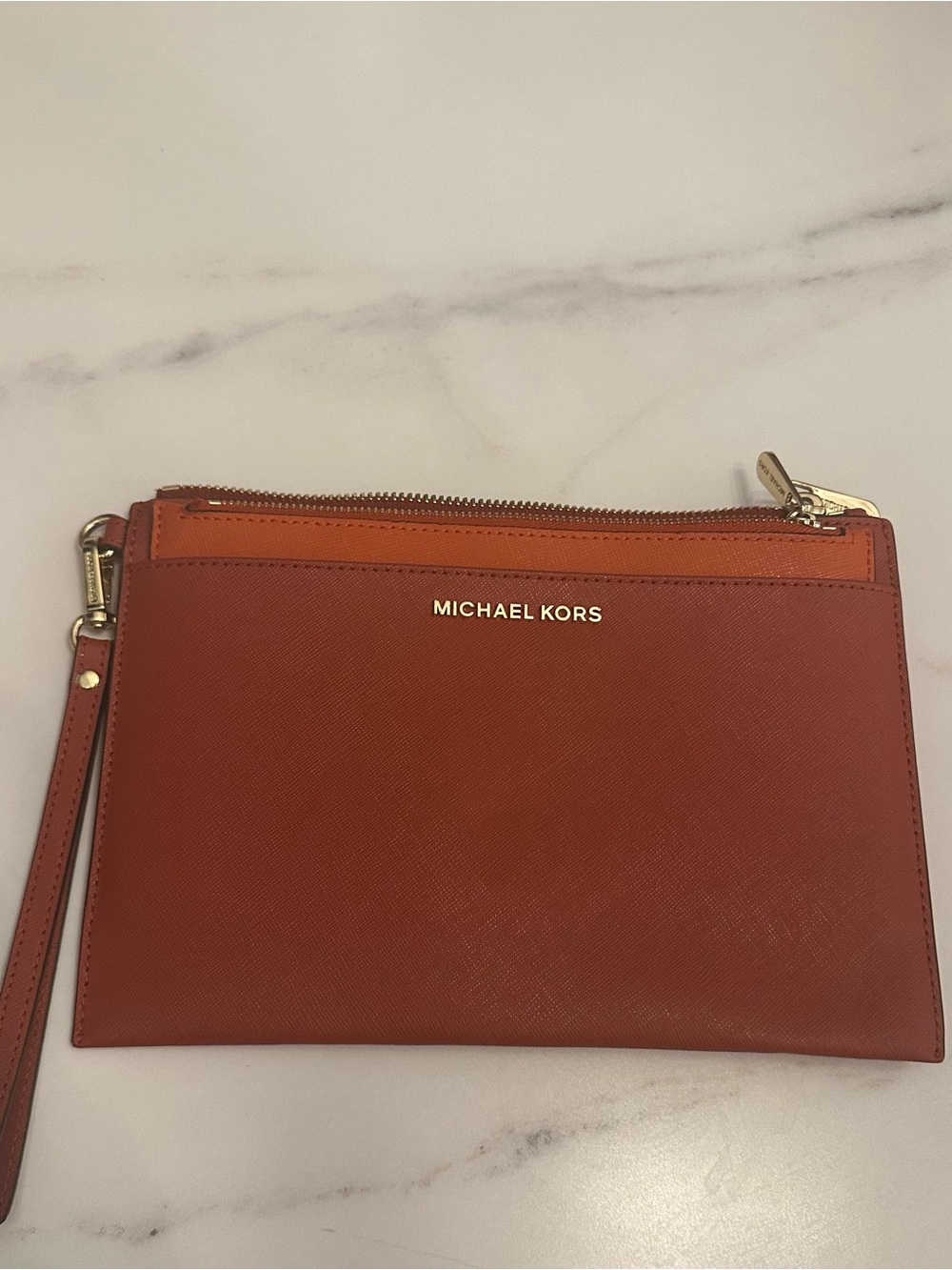 Michael Kors Leather Wristlet Clutch in Burnt Orange and Rust